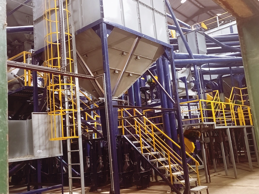 Coffee Processing machinery on a raised steel base/foundation.